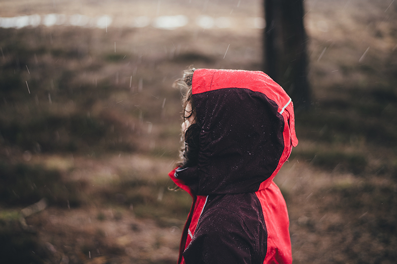 The small child in rain with raincoat at Abbotsford BC