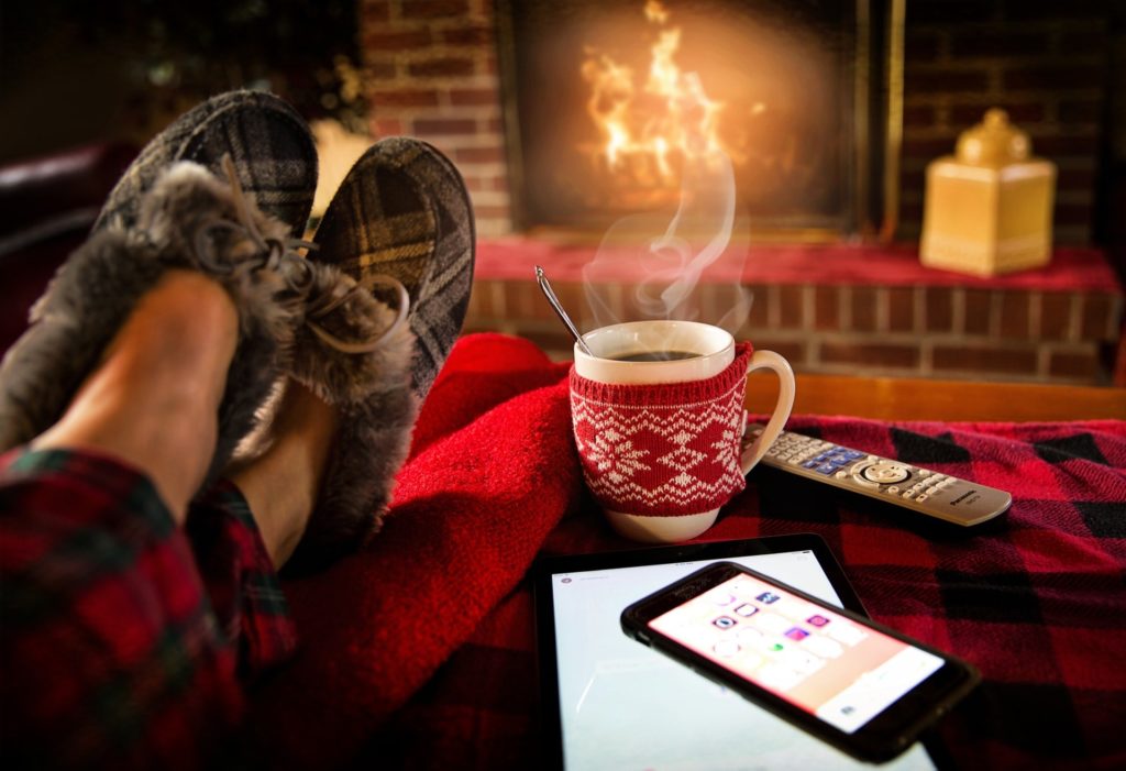 feet by the fireplace