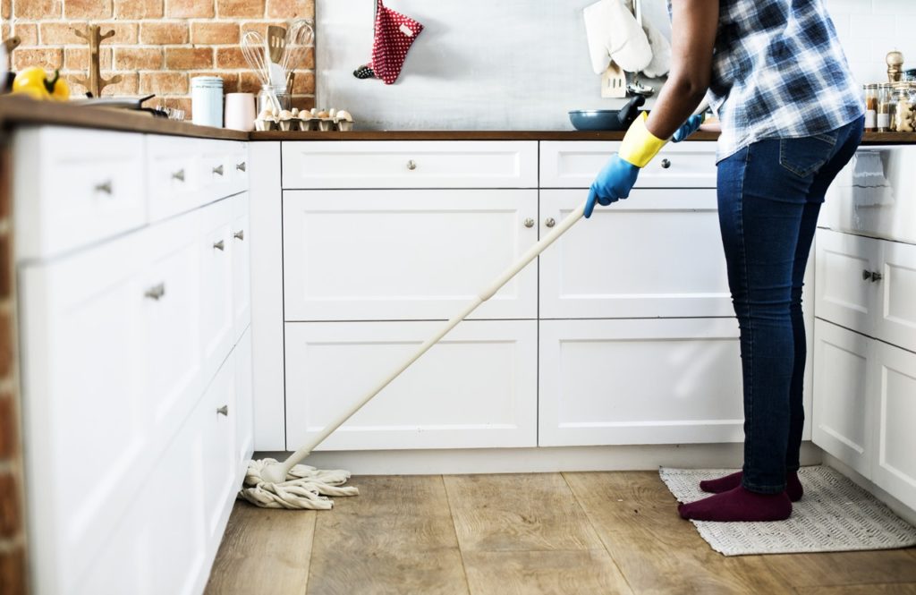 The person cleaning the kitchen in home at Abbotsford BC