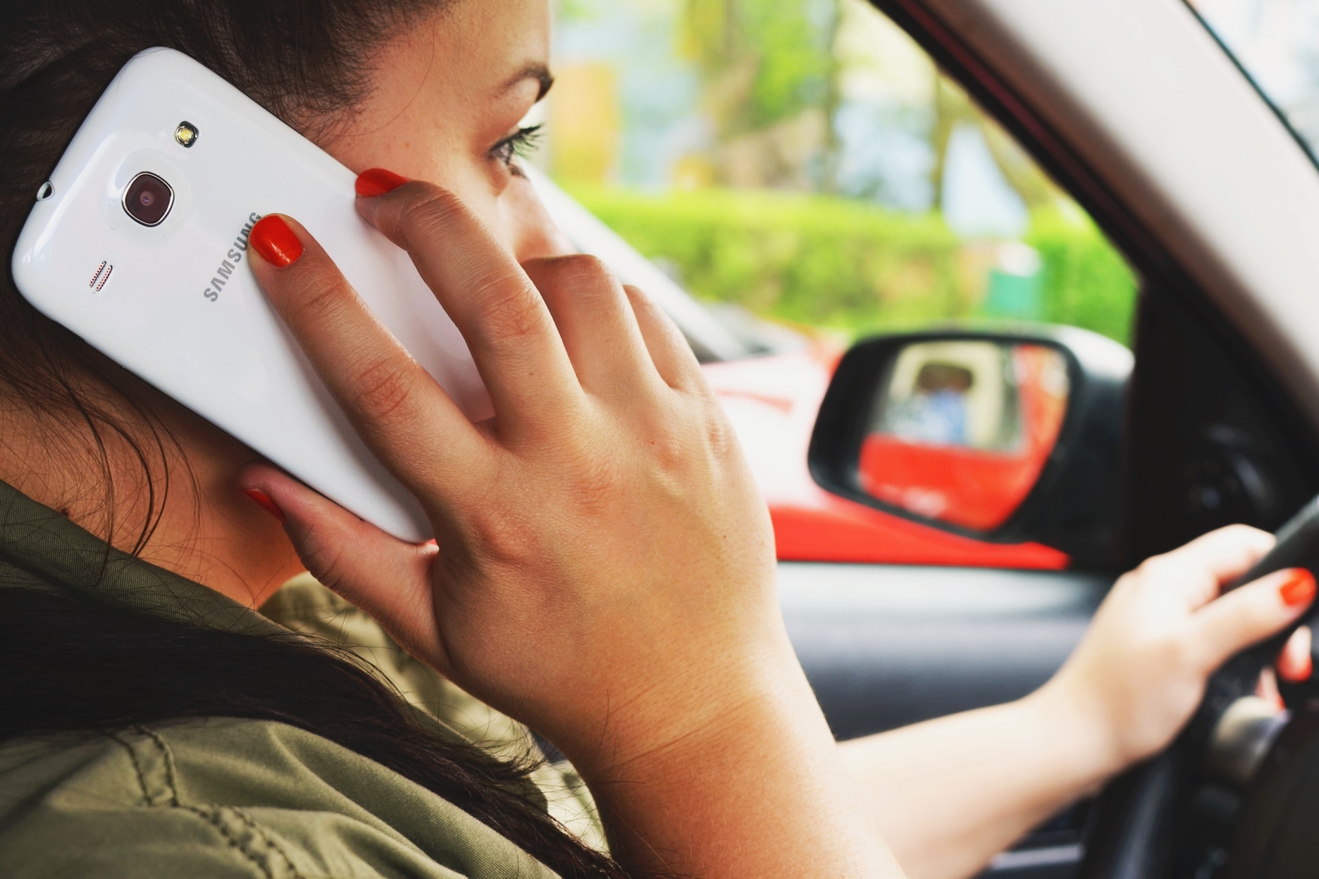 The women speaking phone while driving the car at Abbotsford BC