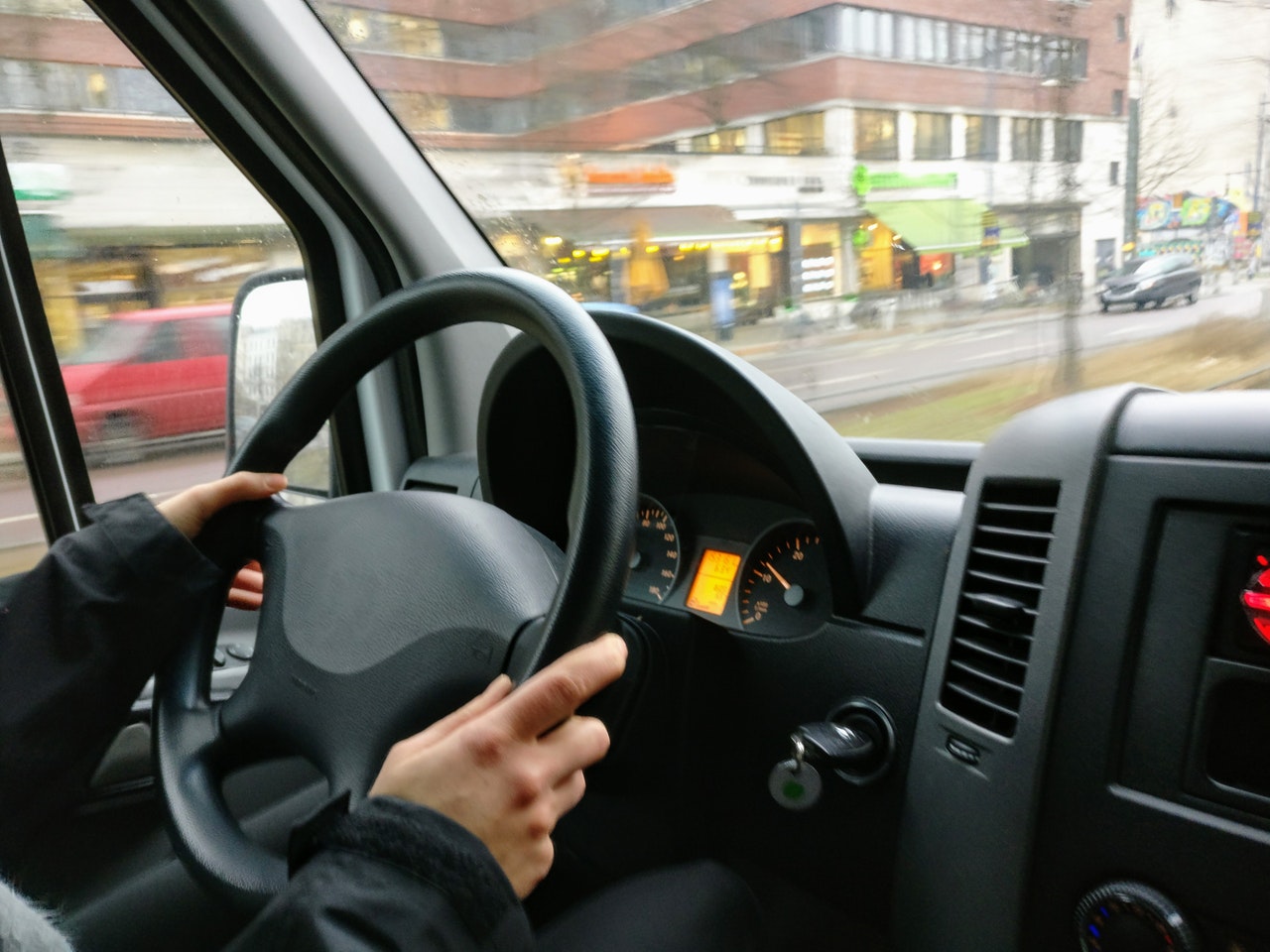 The inside view of the man driving a car