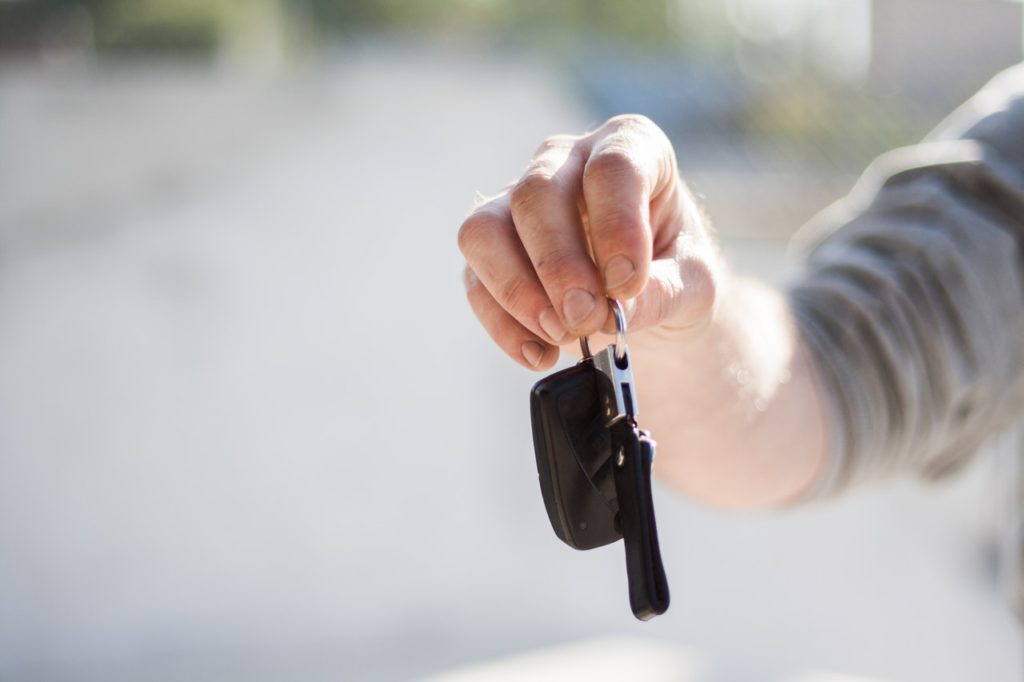 Hand holding set of keys