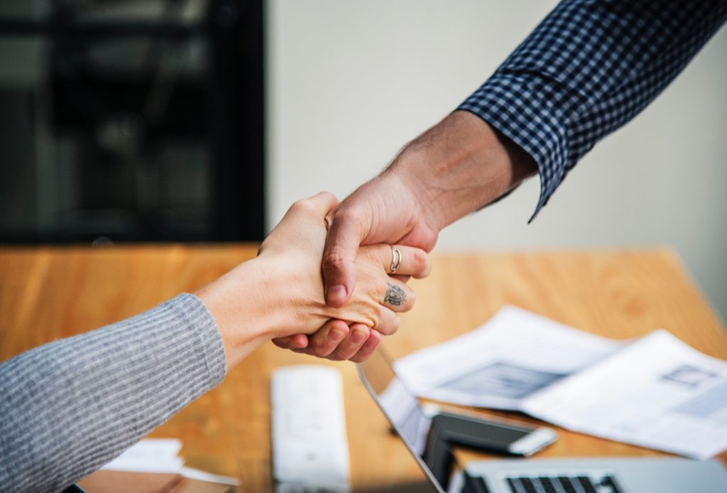 Two people shaking hands