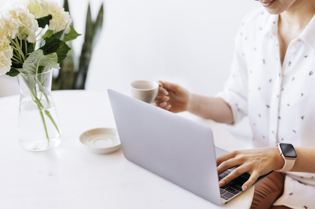 Person browsing on laptop
