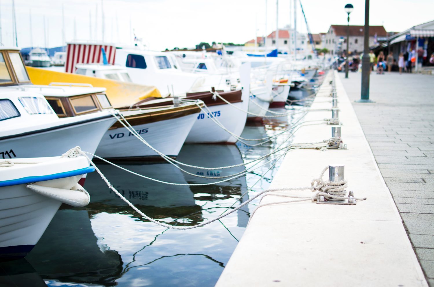 Boats docked along a waterfront pier in British Columbia. 