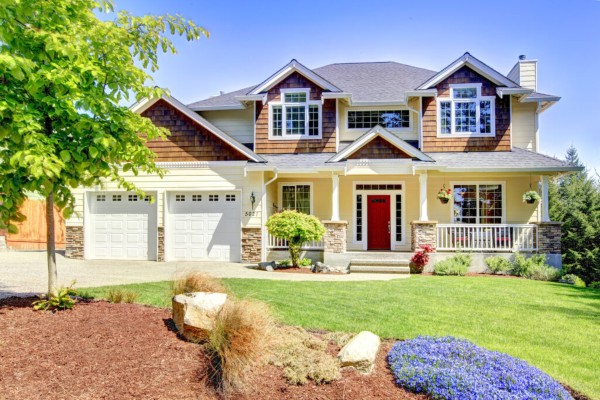 Large American beautiful house with red door
