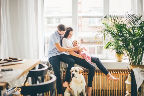 A family at home with a baby