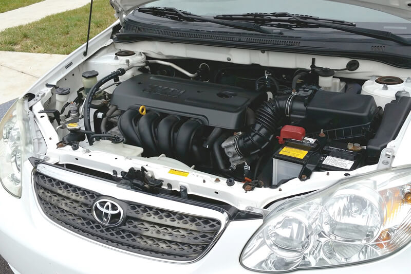 Toyota with hood popped open